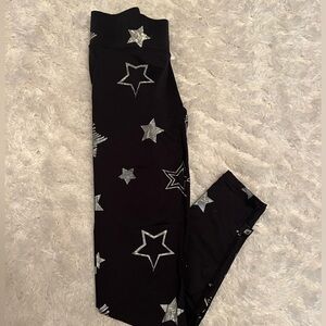 Star patterned Terez black leggings